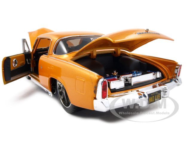 1953 STUDEBAKER STARLINER ORANGE 118 DIECAST MODEL CAR BY MAISTO 