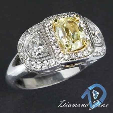 65 NATURAL FANCY YELLOW DIAMOND ESTATE COCKTAIL RING  