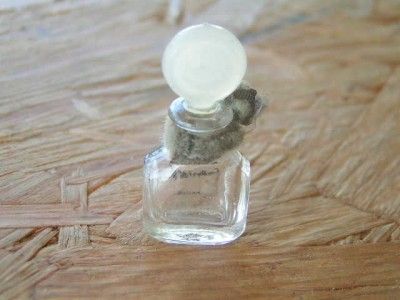 am very pleased to offer a beautiful vintage tiny perfume bottle 