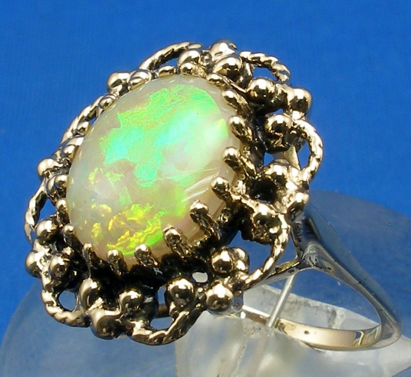 66 ct Opal, 14k Yellow Gold Ring, Broadflash fire  