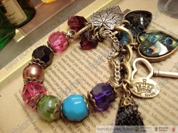   peafowl charm bracelet Heart love key leaf crown tassels purl  