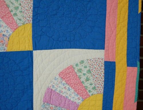 The WONDERFUL ATTENTION TO DETAIL, GREAT COLORS, and DENSE QUILTING 